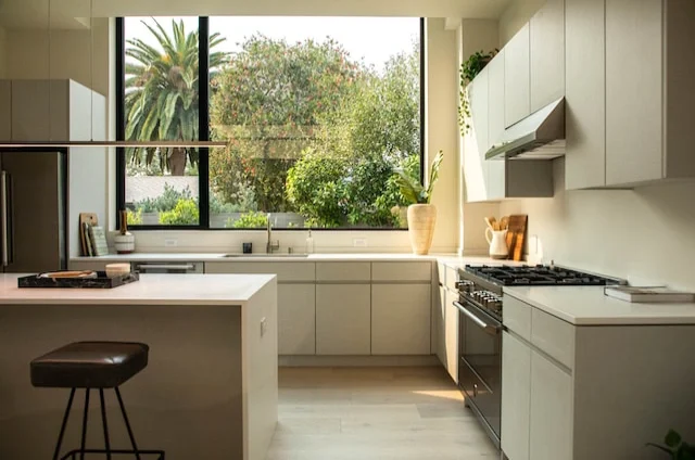 home interior designer in chennai designed Beige-coloured G-shaped Peninsula Interior Design for the Kitchen