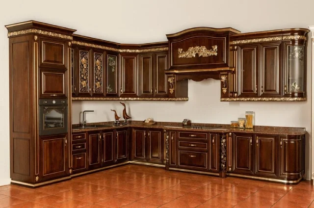 Royal kitchen interior design with Burgundy Wooden Cabinets from ORGO Interiors