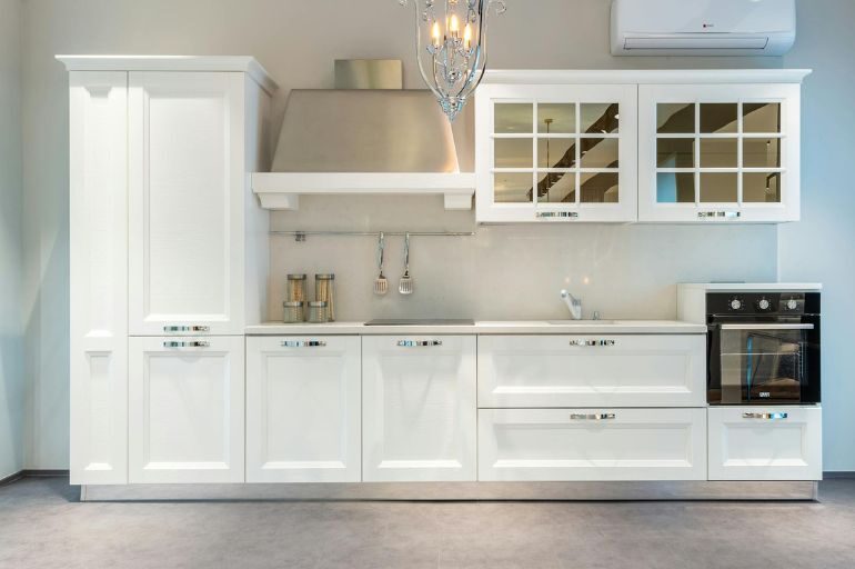 White and Golden Traditional kitchen in chennai